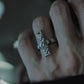 Close up of hand wearing Monora Studio modern punk molten metal slab ring unisex fashion⁠
