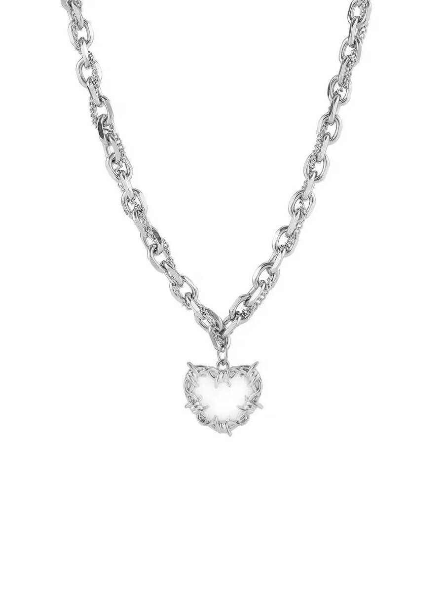 Monora Studio stainless steel barbed white heart necklace, liquid metal style, silver thorn heart pendant for cyber goth outfits.