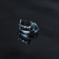 Intricate silver katana sword wrap ring on dark reflective surface, detailed Japanese sword design jewelry, tarnish-proof stainless steel amulet, Monora Studio.
