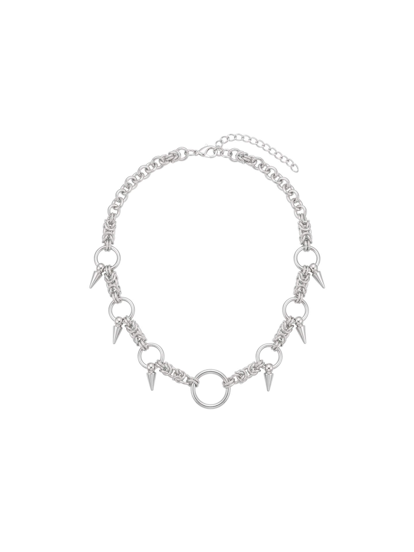 Model wearing Monora Studio stainless steel O-ring spike choker necklace with alternative minimalist streetwear style⁠