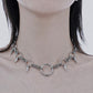 Professional studio shot of silver premium stainless steel tarnish free Byzantine chain spike necklace on pure white background⁠