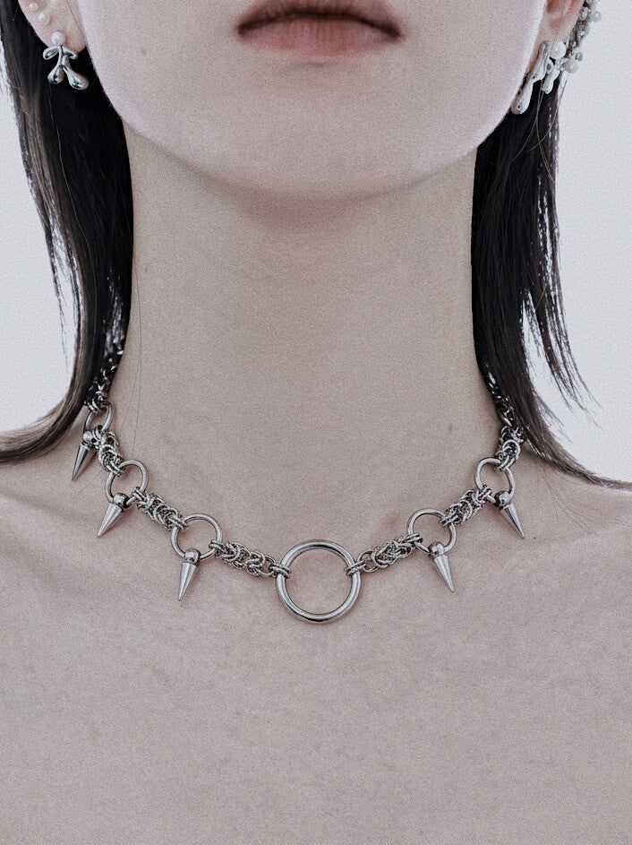 Professional studio shot of silver premium stainless steel tarnish free Byzantine chain spike necklace on pure white background⁠