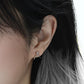 925 sterling silver star earrings with asymmetrical wave loop design, minimalist and edgy look.
