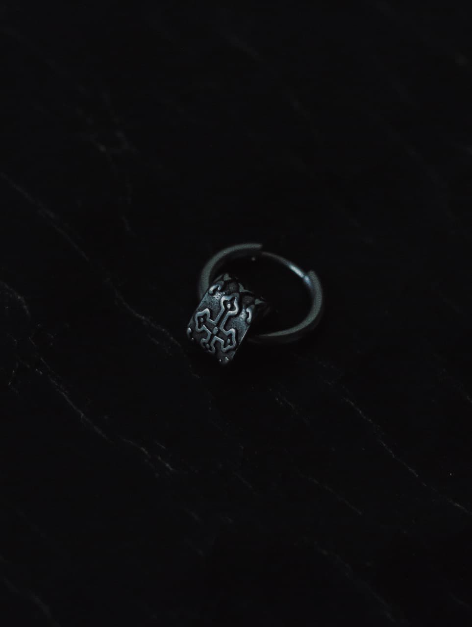 stainless steel crucifix lock hoop earring with gothic design – dark punk streetwear accessory.
