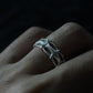 925 sterling silver openwork ring with architectural cutout design.
