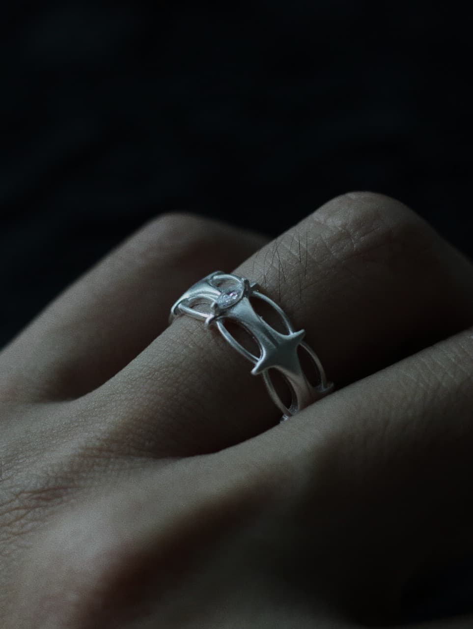 925 sterling silver openwork ring with architectural cutout design.