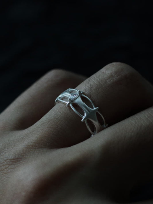 925 sterling silver openwork ring with architectural cutout design.